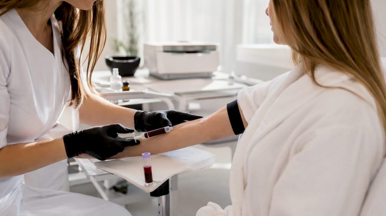 Clinician drawing blood for PRP preparation