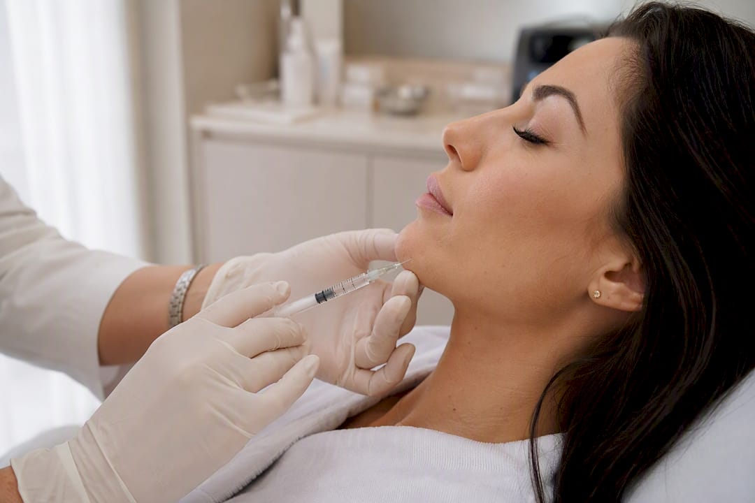 Clinician injecting dermal filler close-up