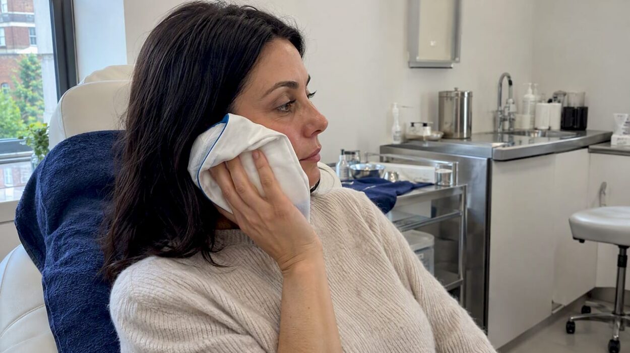 Patient using cold pack after treatment