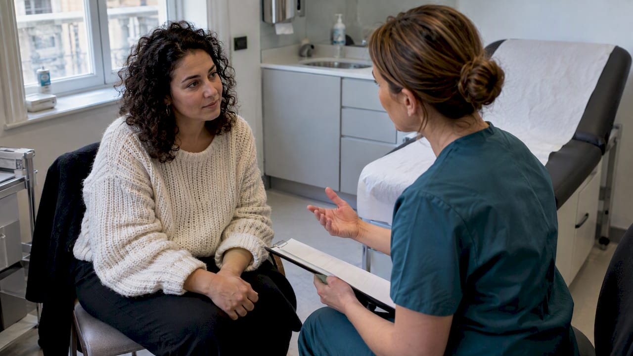 Patient discussing breastfeeding before Botox treatment
